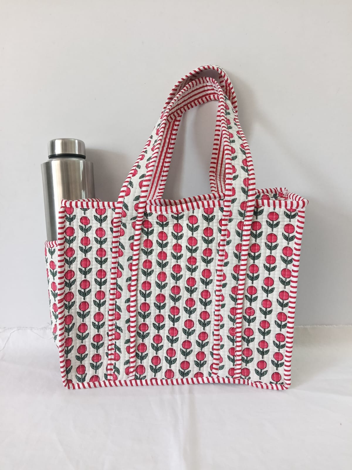 small quilted tote with side pocket