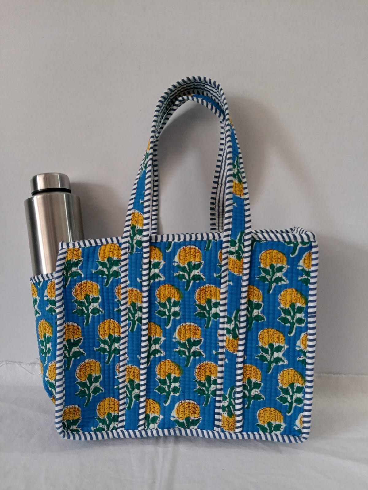 small quilted tote with side pocket
