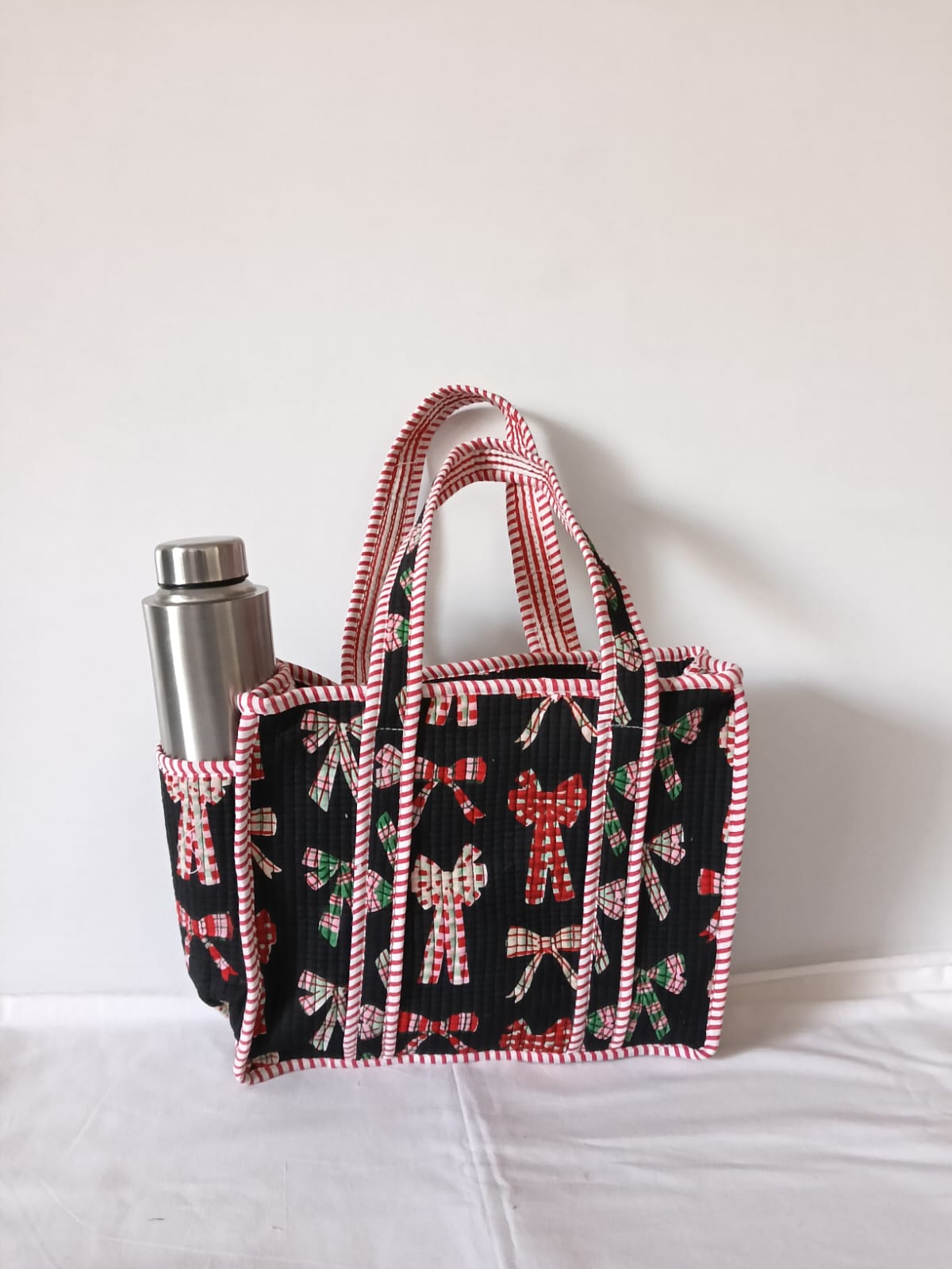 small quilted tote with side pocket