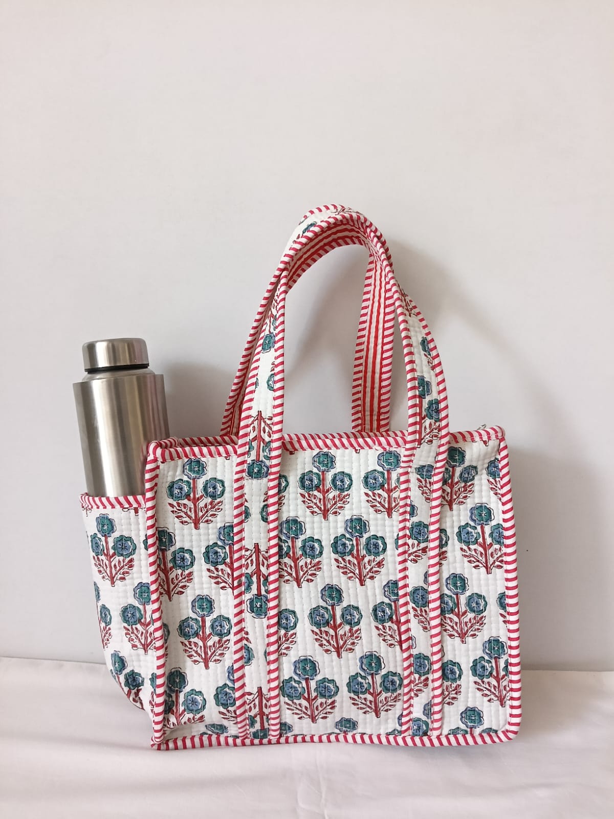 small quilted tote with side pocket