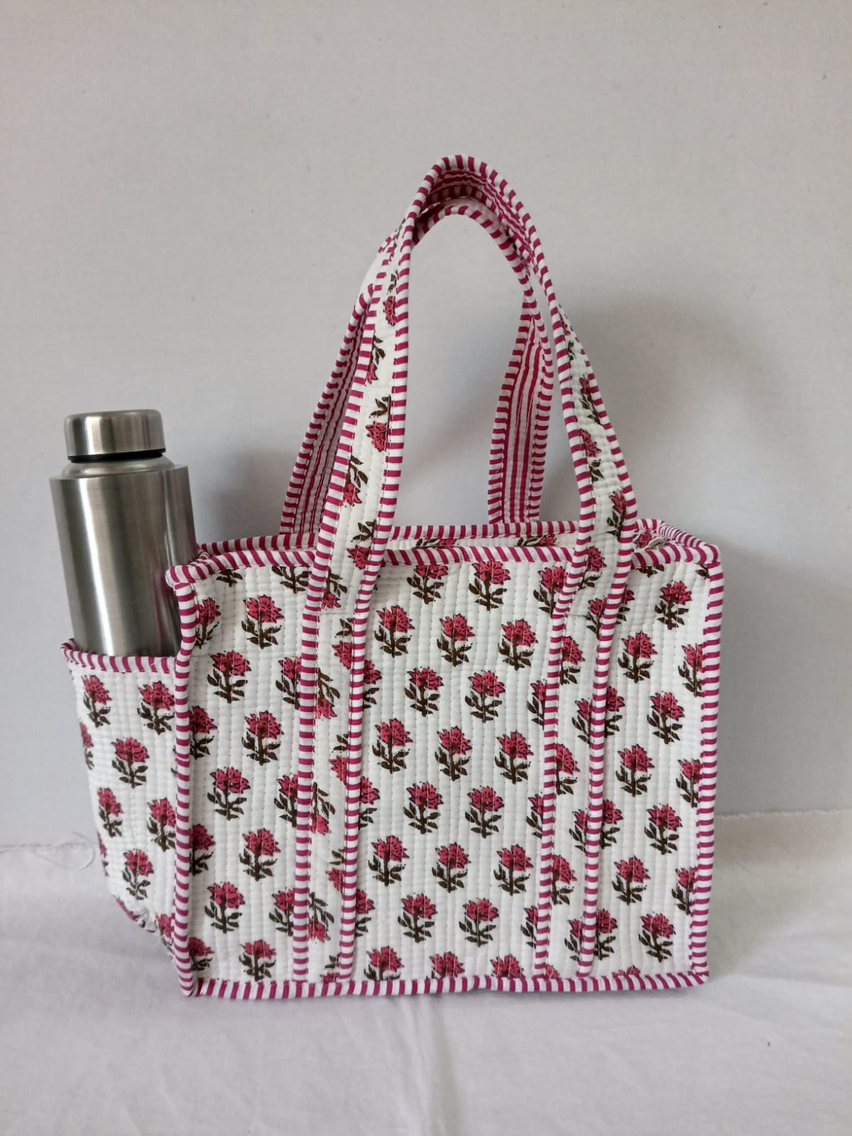 small quilted tote with side pocket