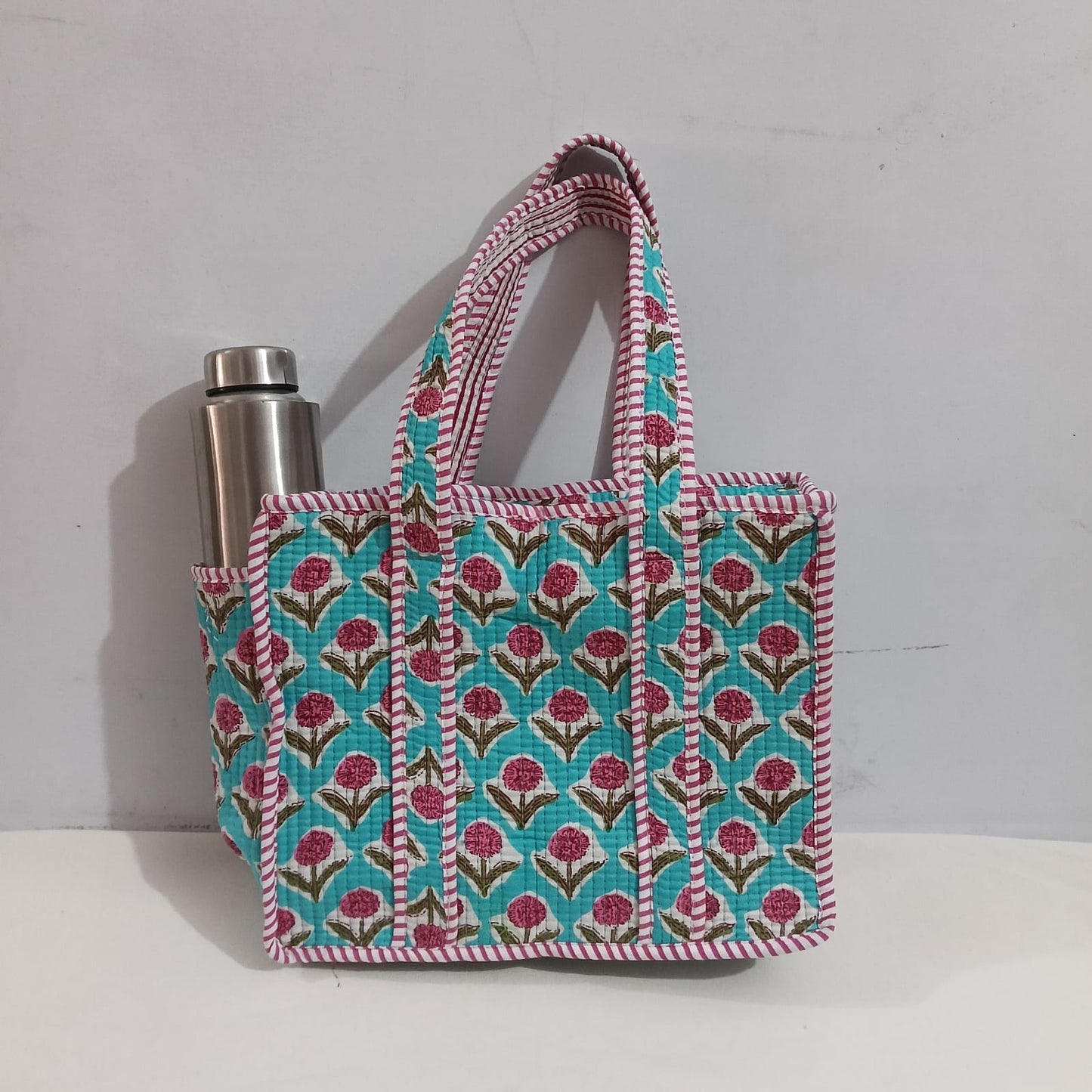 small quilted tote with side pocket