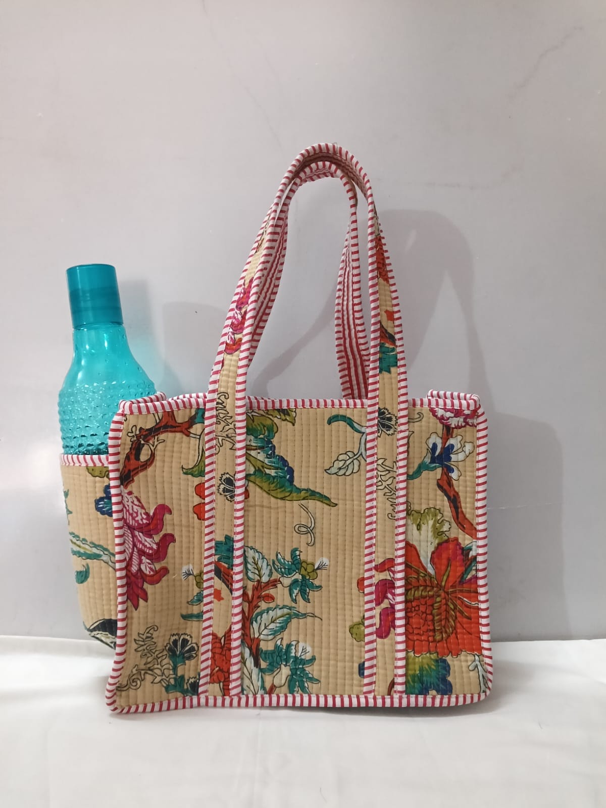 small quilted tote with side pocket