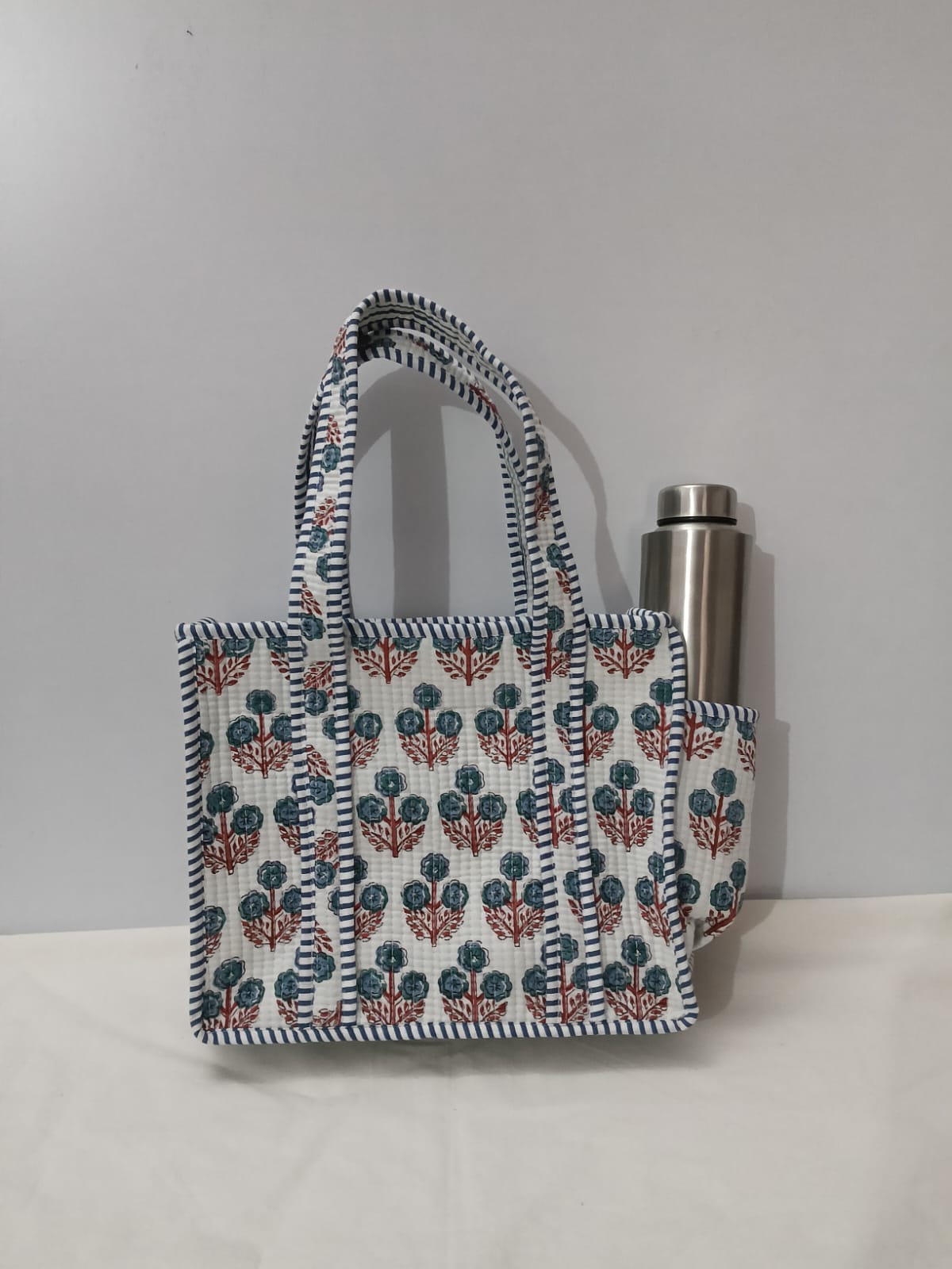 small quilted tote with side pocket