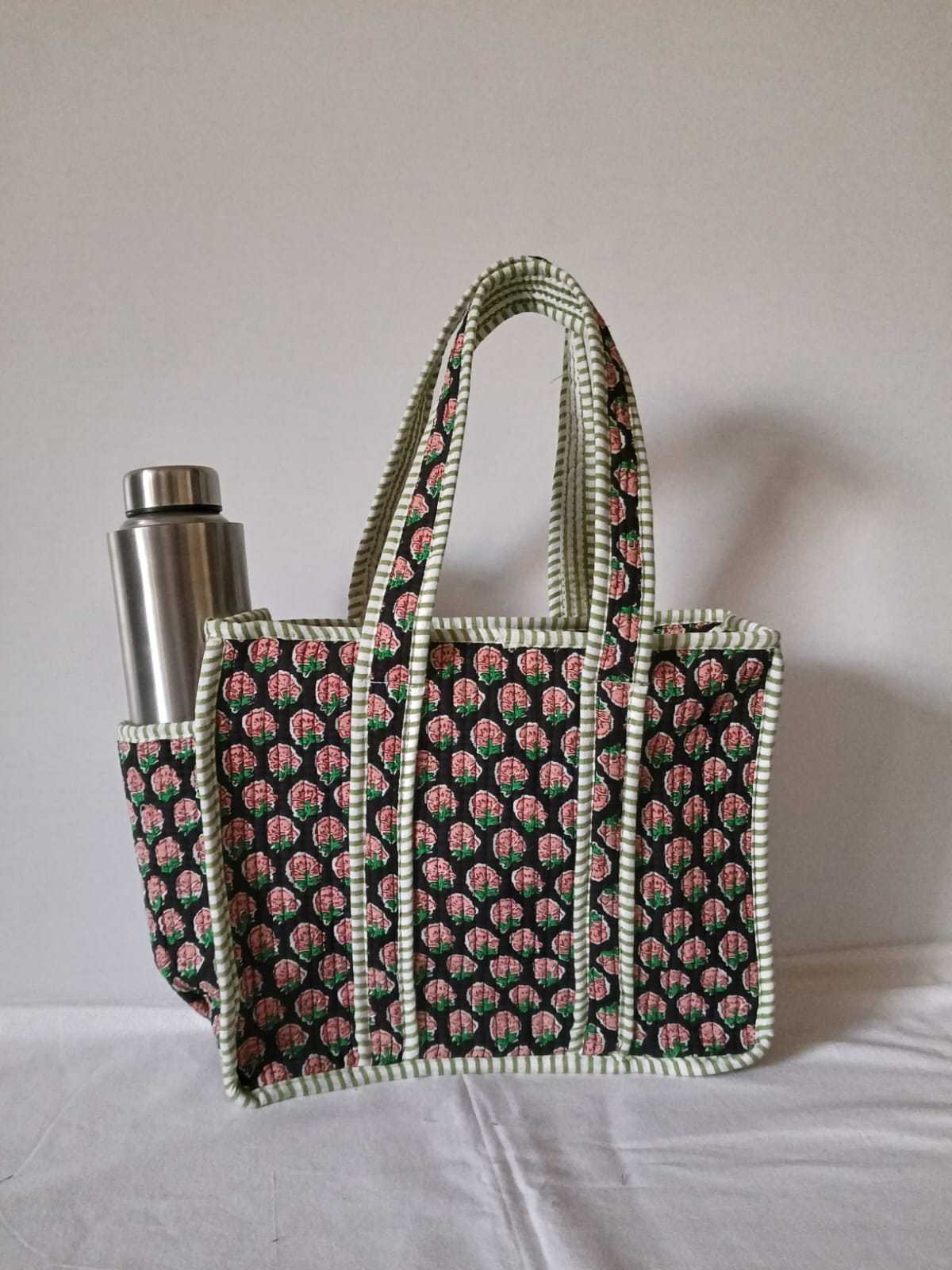 small quilted tote with side pocket