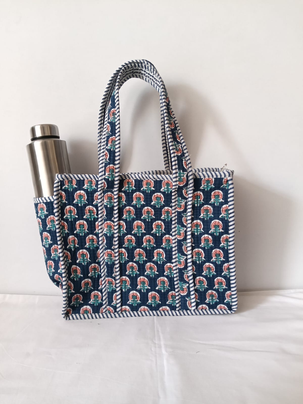 small quilted tote with side pocket