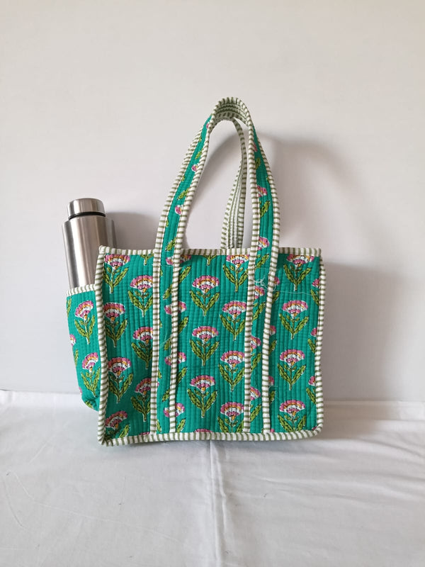 small quilted tote with side pocket