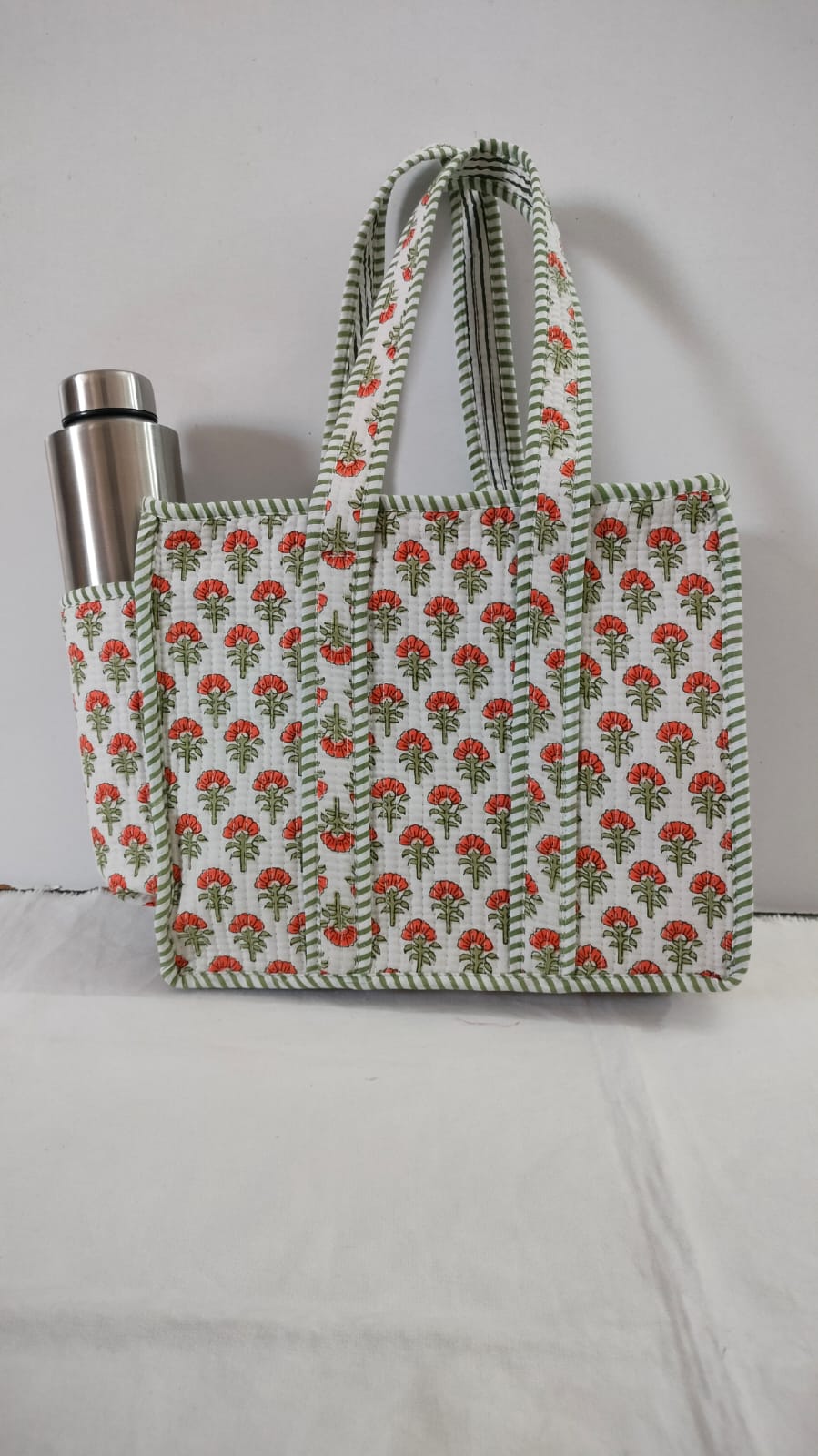small quilted tote with side pocket