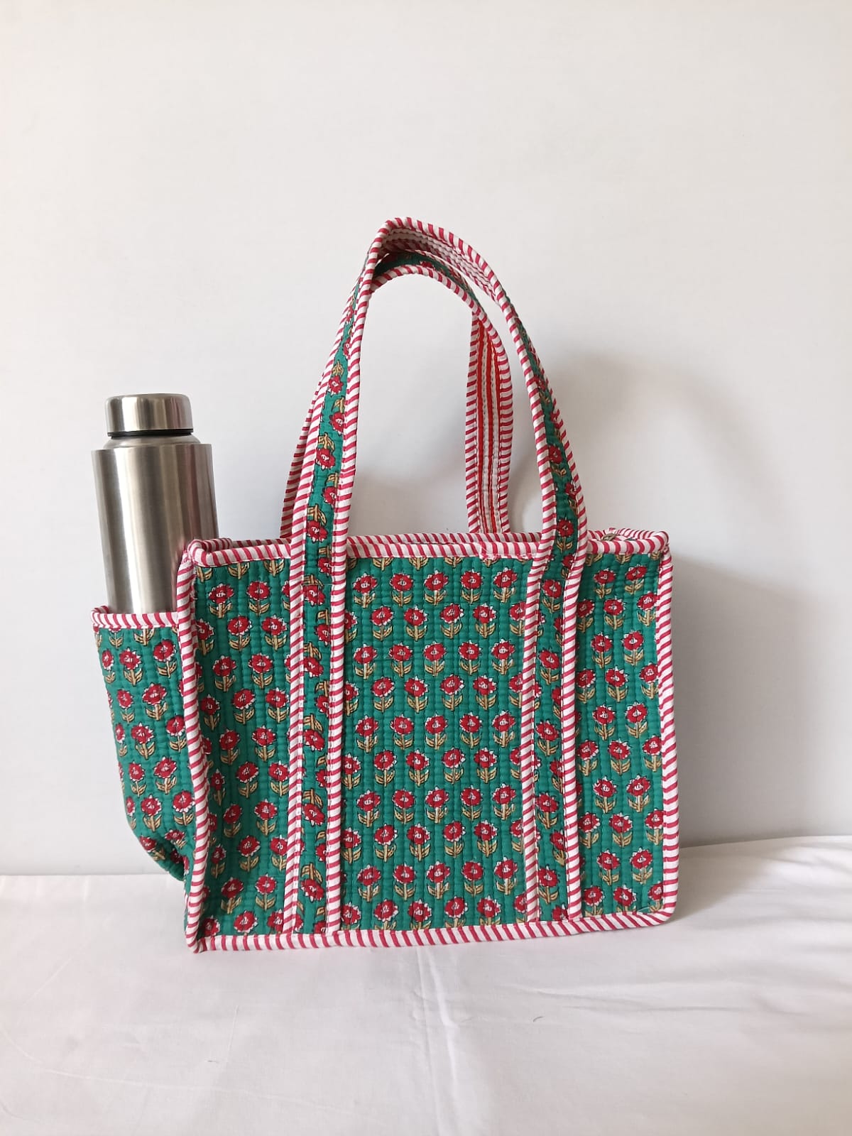 small quilted tote with side pocket