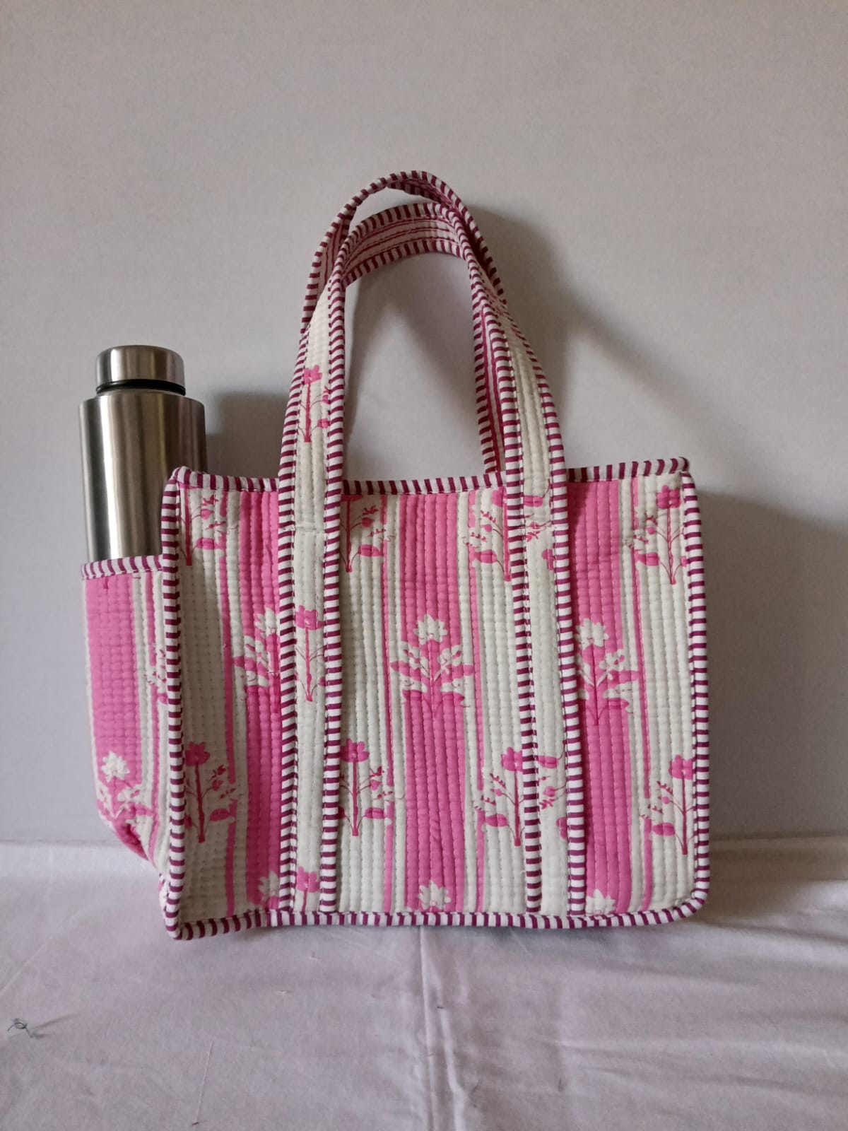 small quilted tote with side pocket