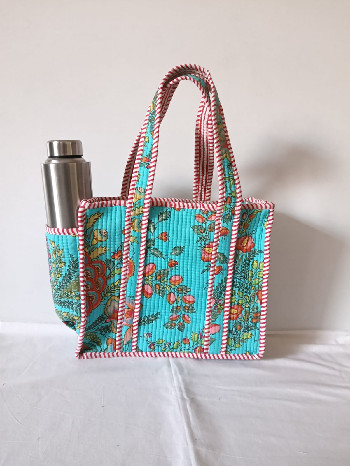 small quilted tote with side pocket