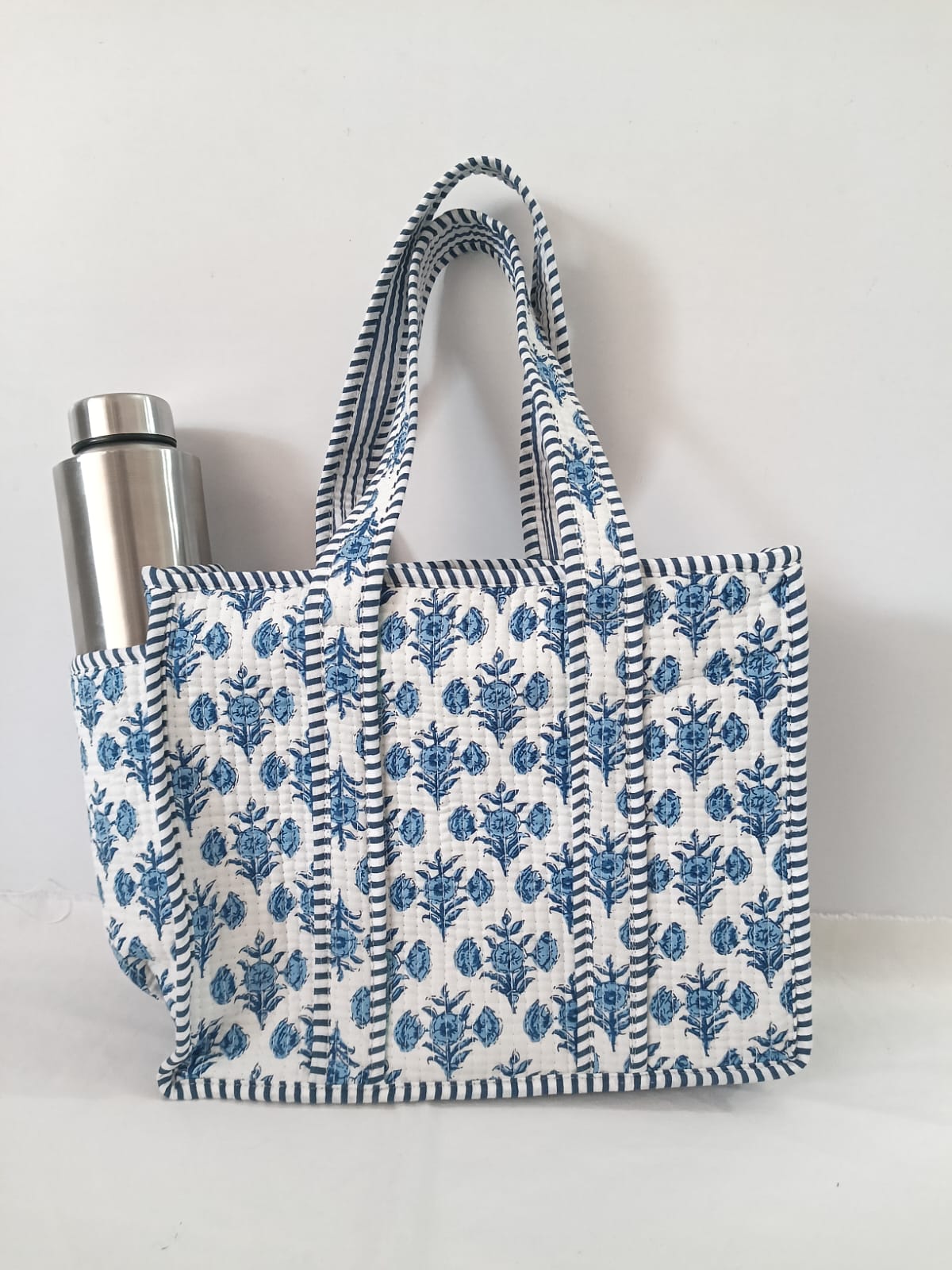 small quilted tote with side pocket
