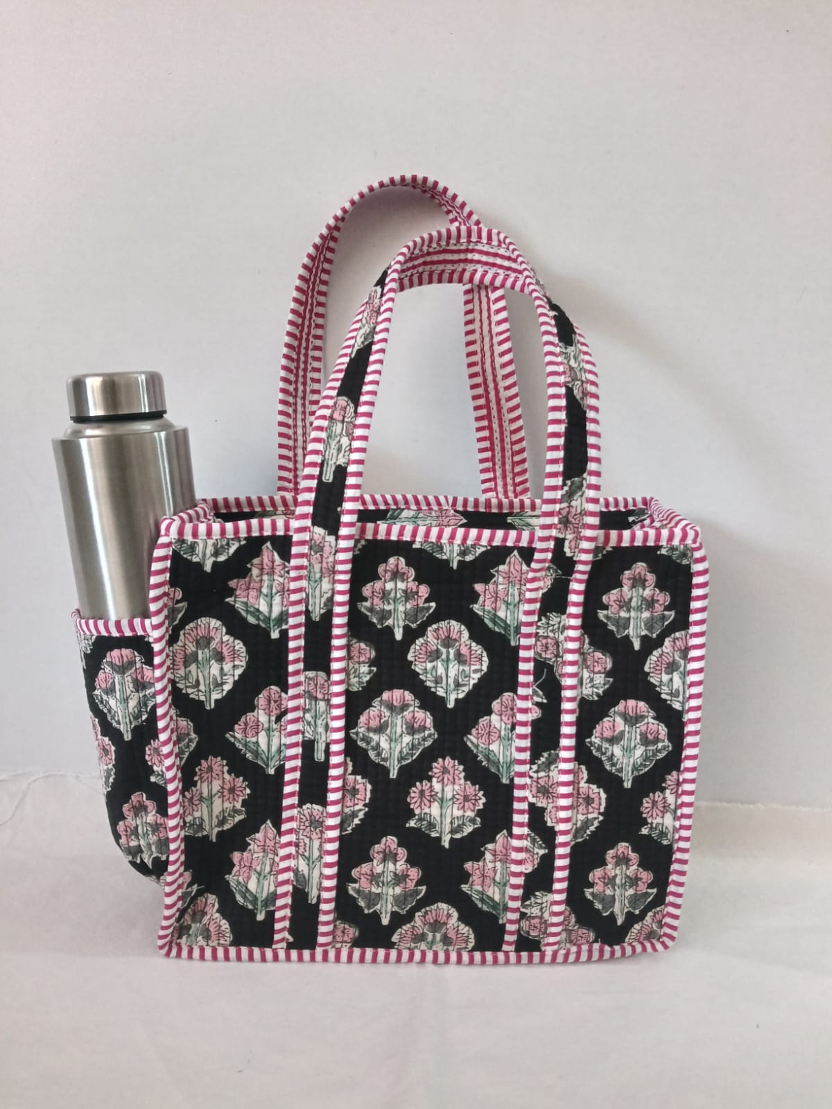 small quilted tote with side pocket