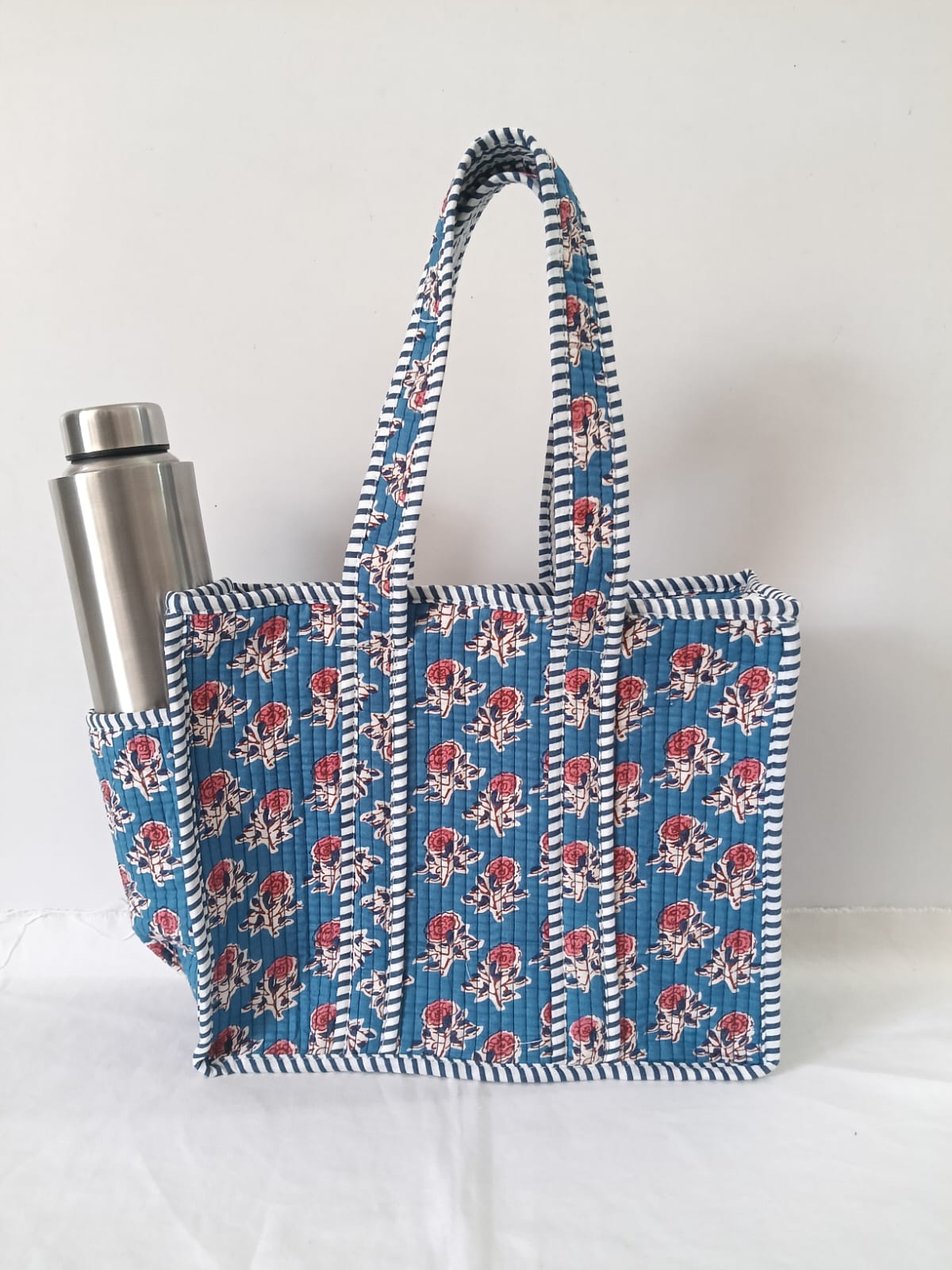 small quilted tote with side pocket