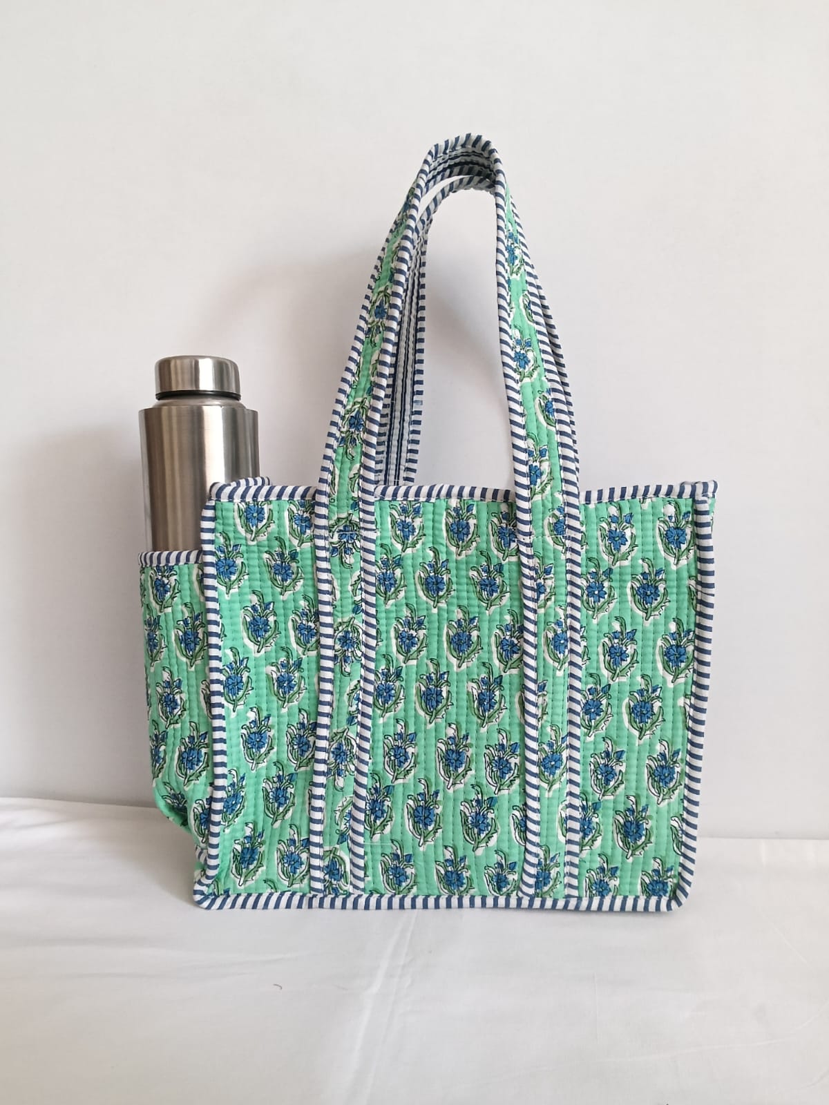 small quilted tote with side pocket