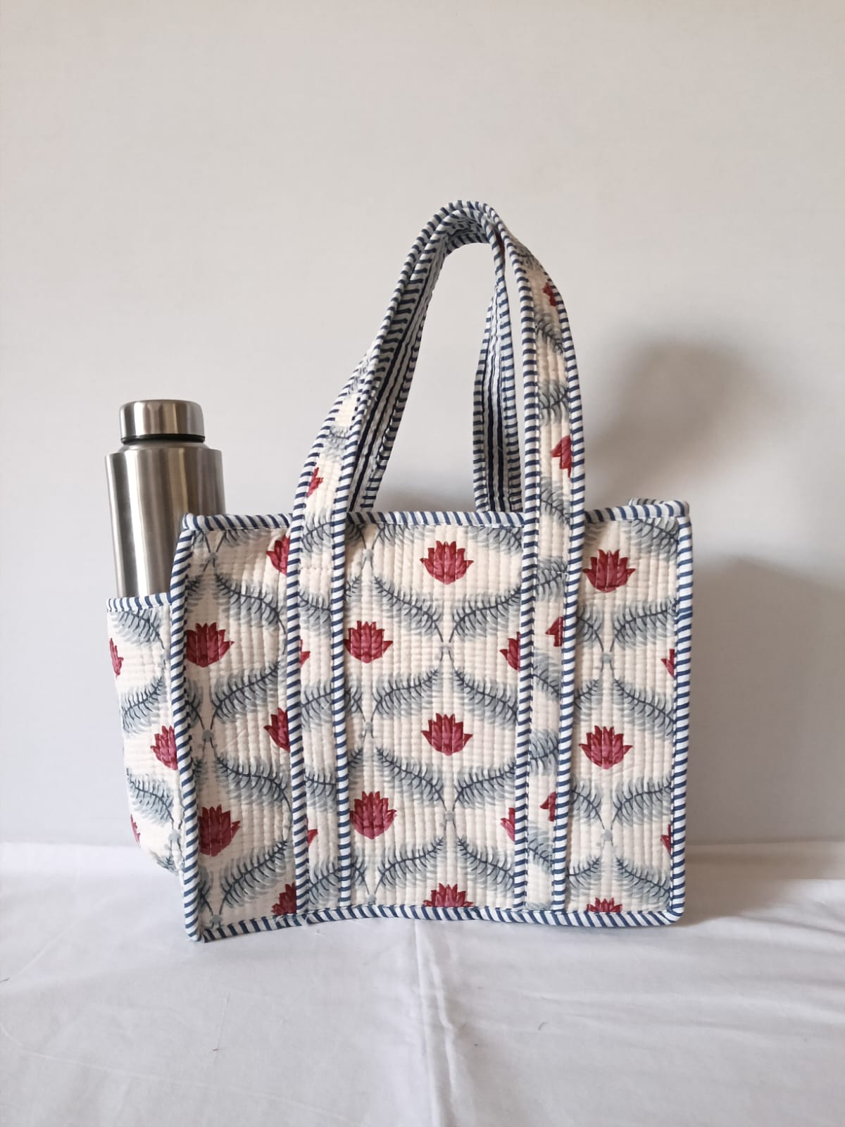 small quilted tote with side pocket