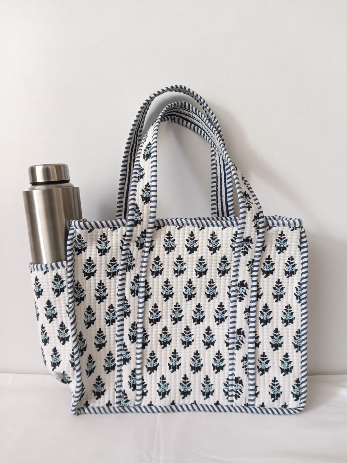 small quilted tote with side pocket