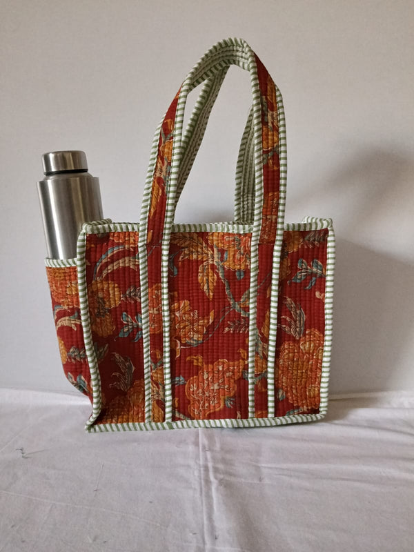 small quilted tote with side pocket