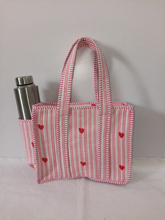 small quilted tote with side pocket