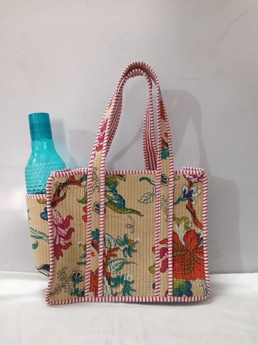 small quilted tote with side pocket